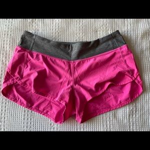 Pink shorts, gray waistband lululemon shorts size 8